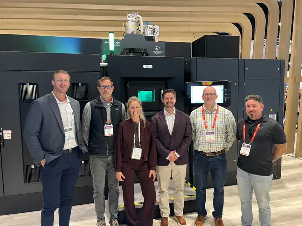EOS and Evology representatives pictured at IMTS 2026.