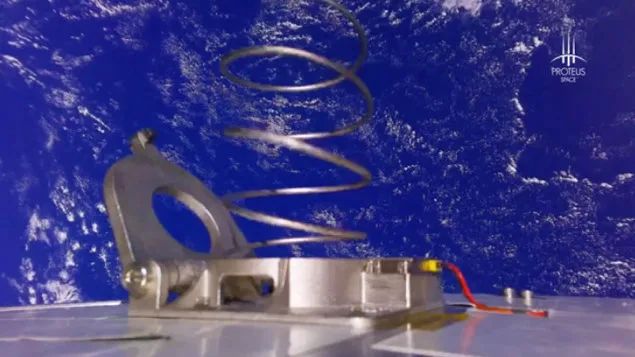 JACC’s printed titanium mechanism after deployment, recorded by the spacecraft’s camera.